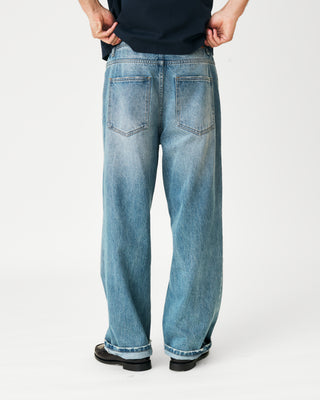 BAGGY MID-WASHED DENIM TROUSERS