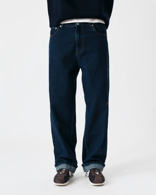 BAGGY DARK DENIM LOGO TROUSERS