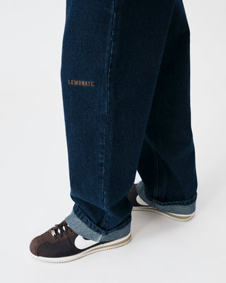 BAGGY DARK DENIM LOGO TROUSERS