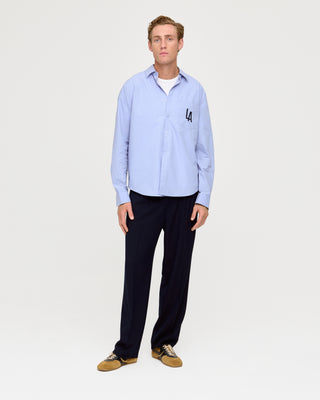 EMBROIDERED PATCH POCKET SHIRT LIGHT BLUE